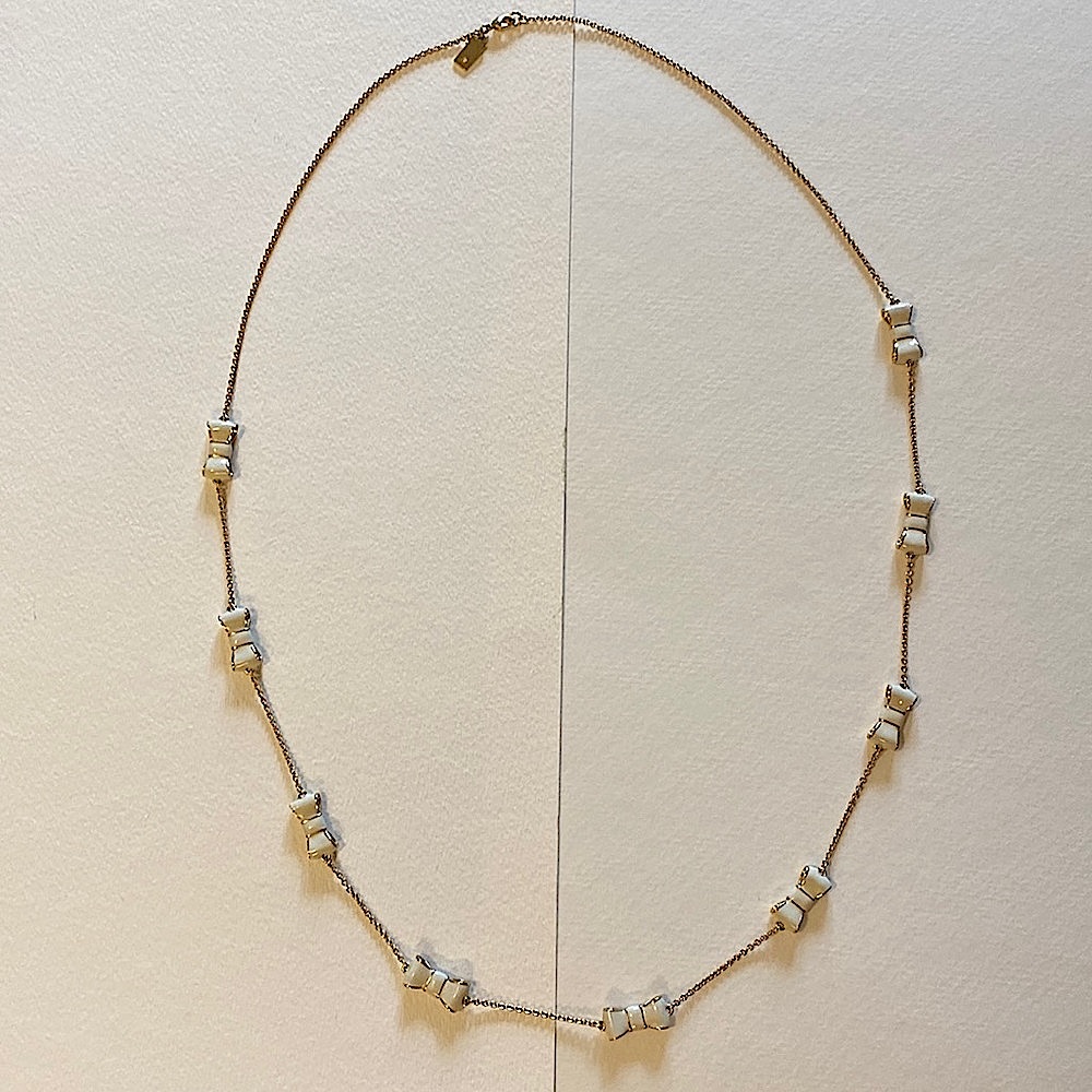 EUC Kate Spade Gold Bow Necklace.